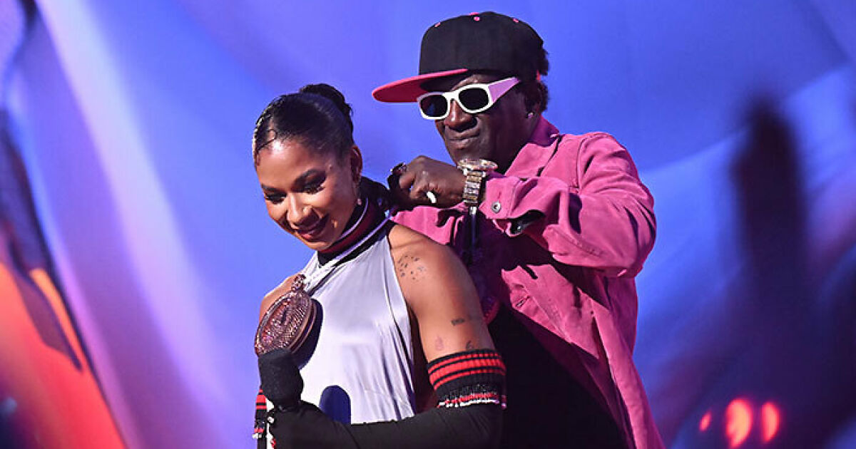 Jordan Chiles Emotional As Flavor Flav Gifts Her A Bronze Clock At VMAs: “You Deserve Everything”